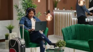 Traveller watches tv show in lounge area